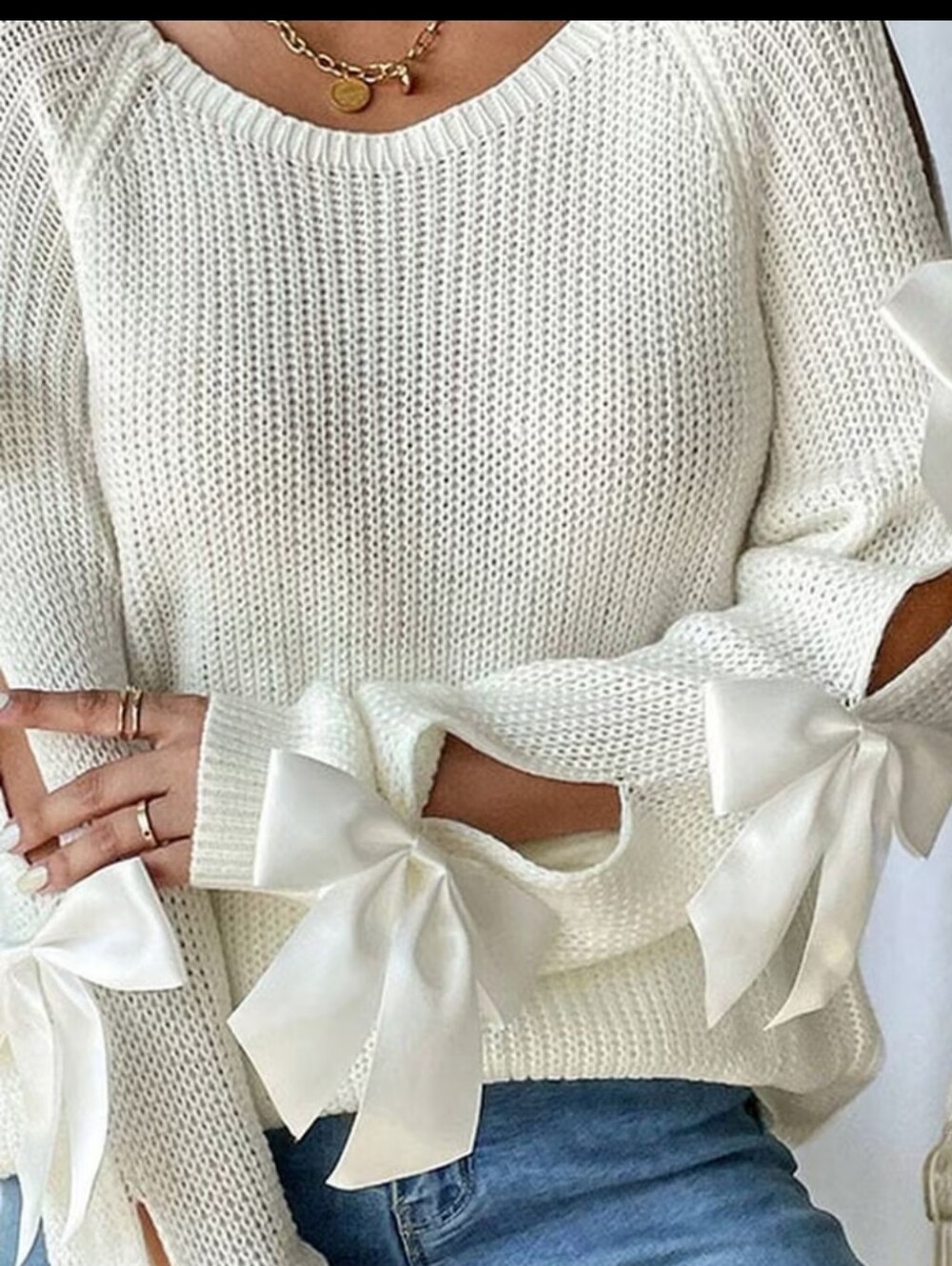 Beautiful Knit Winter White Sweater Adorned With Satin Bow Ties On The Sleeves.